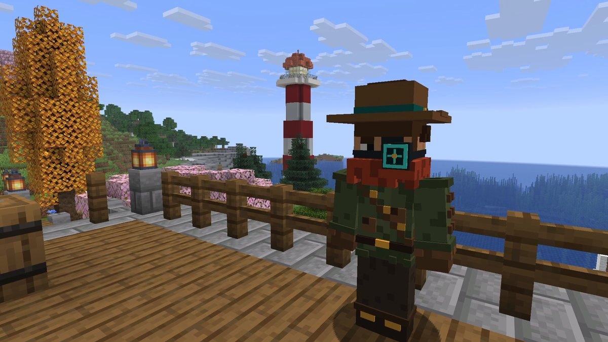 The Mod Hunter with hat and monocle on the pier of the channel world, a red and white lighthouse behind him