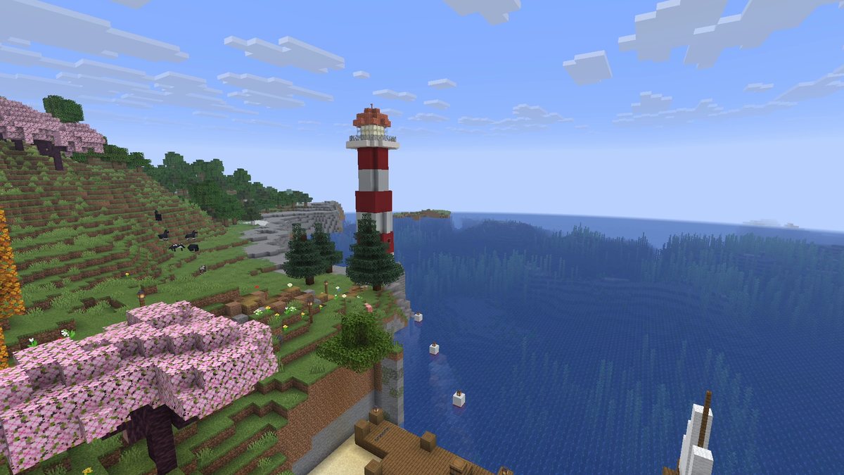 Minecraft screenshot of a bay with a wooden house and a lighthouse