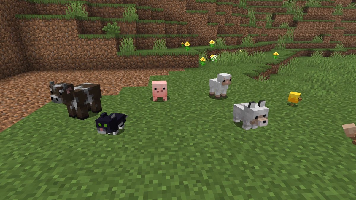 Baby cow, pig, sheep, chicken, cat, wolf and rabbit on a meadow