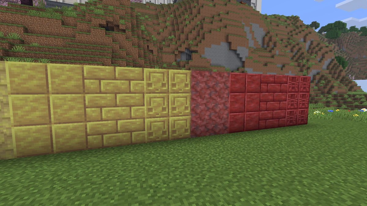 A wall of yellow sulfur blocks and red cinnabar blocks