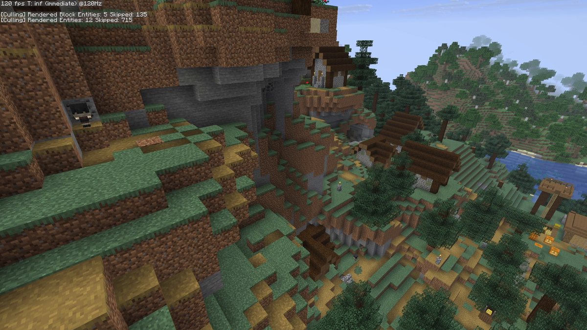 Minecraft screenshot of taiga village houses on a mountain slope