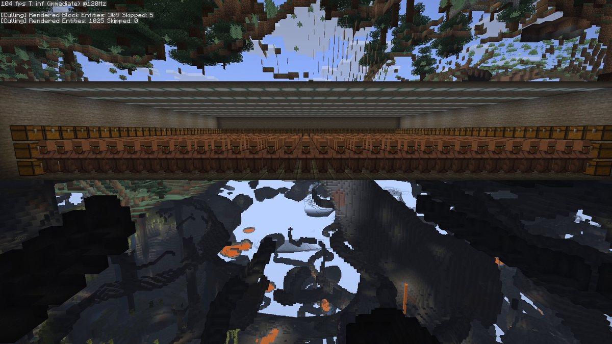 Minecraft screenshot from inside the rock in spectator view, caves visible, the vault with villagers ahead