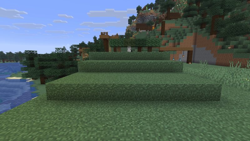 Split Minecraft screenshot of grass terraces: left half vanilla with dirt sides, right half with Fast Better Grass and green sides