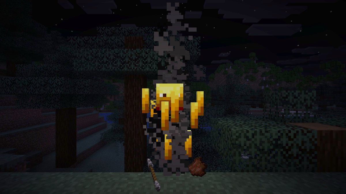 Minecraft screenshot at night of a blaze glowing next to a tree