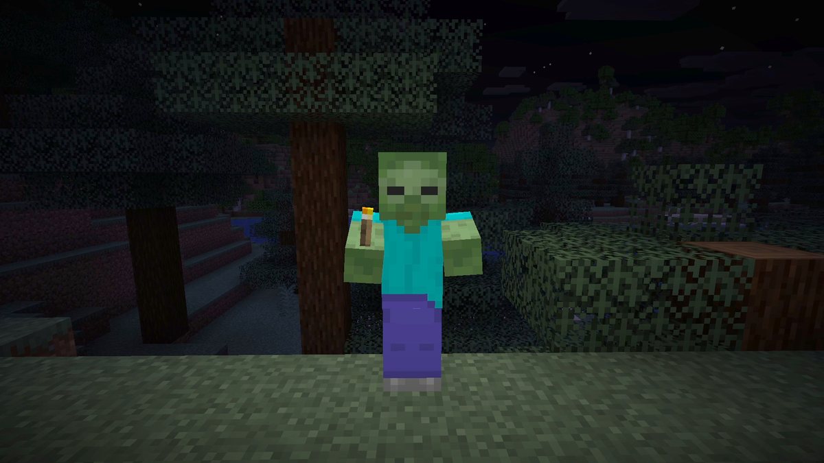 Minecraft screenshot at night of a zombie holding a torch, the ground around it lit