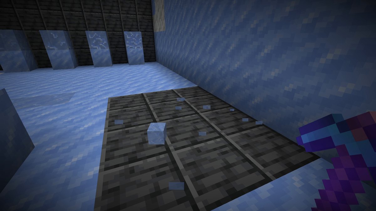 A Brittle Ice item on the floor next to a diamond pickaxe