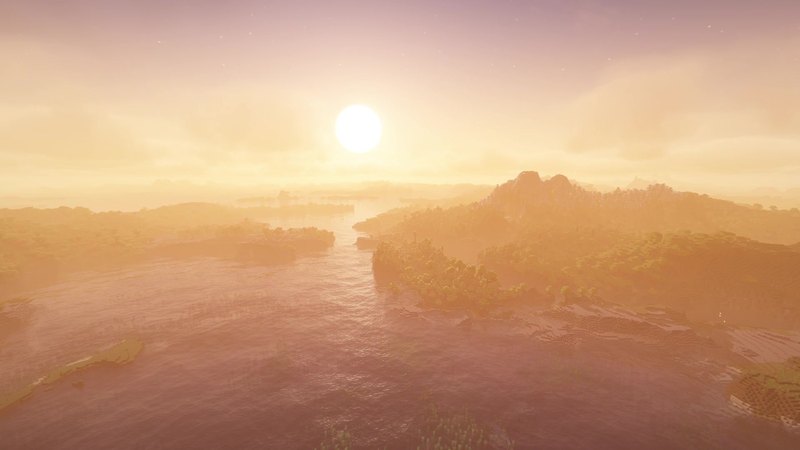 Minecraft screenshot at sunset with shaders: golden light over a bay, islands and hills fading into haze