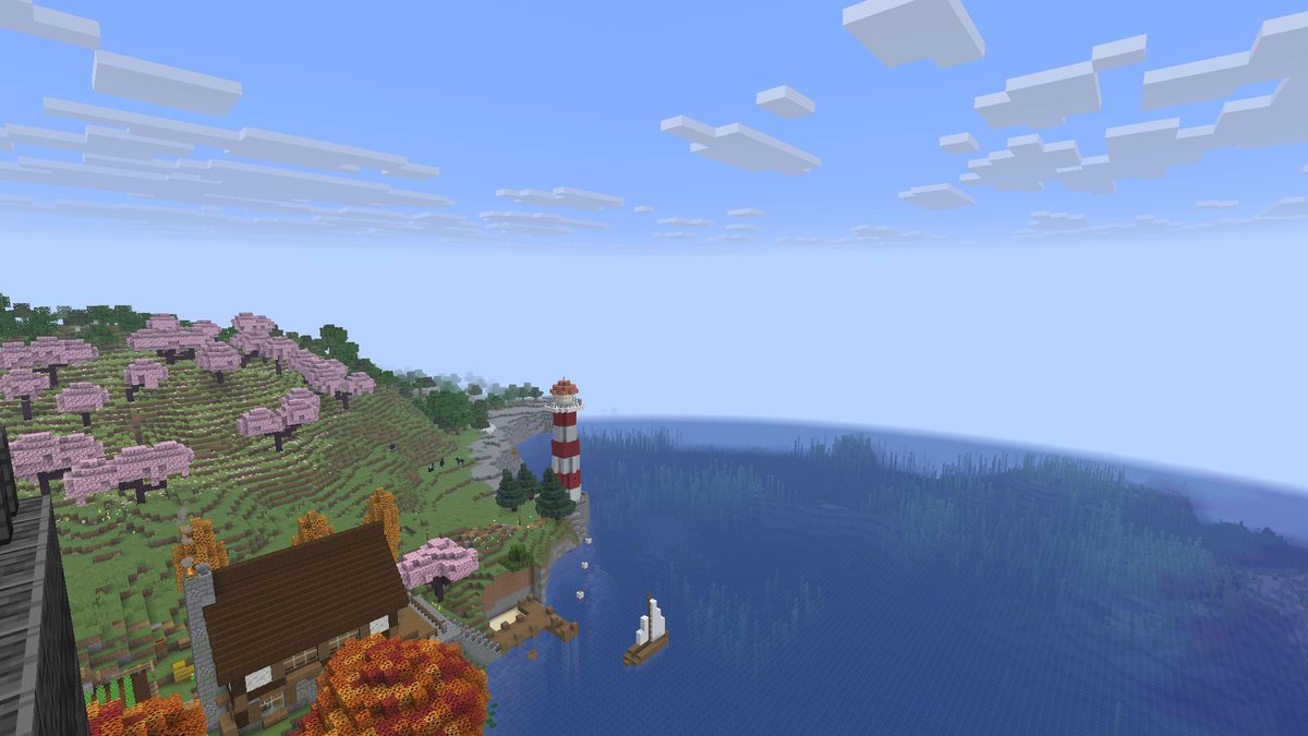 Minecraft screenshot of a bay with a wooden house, a sailboat and a lighthouse